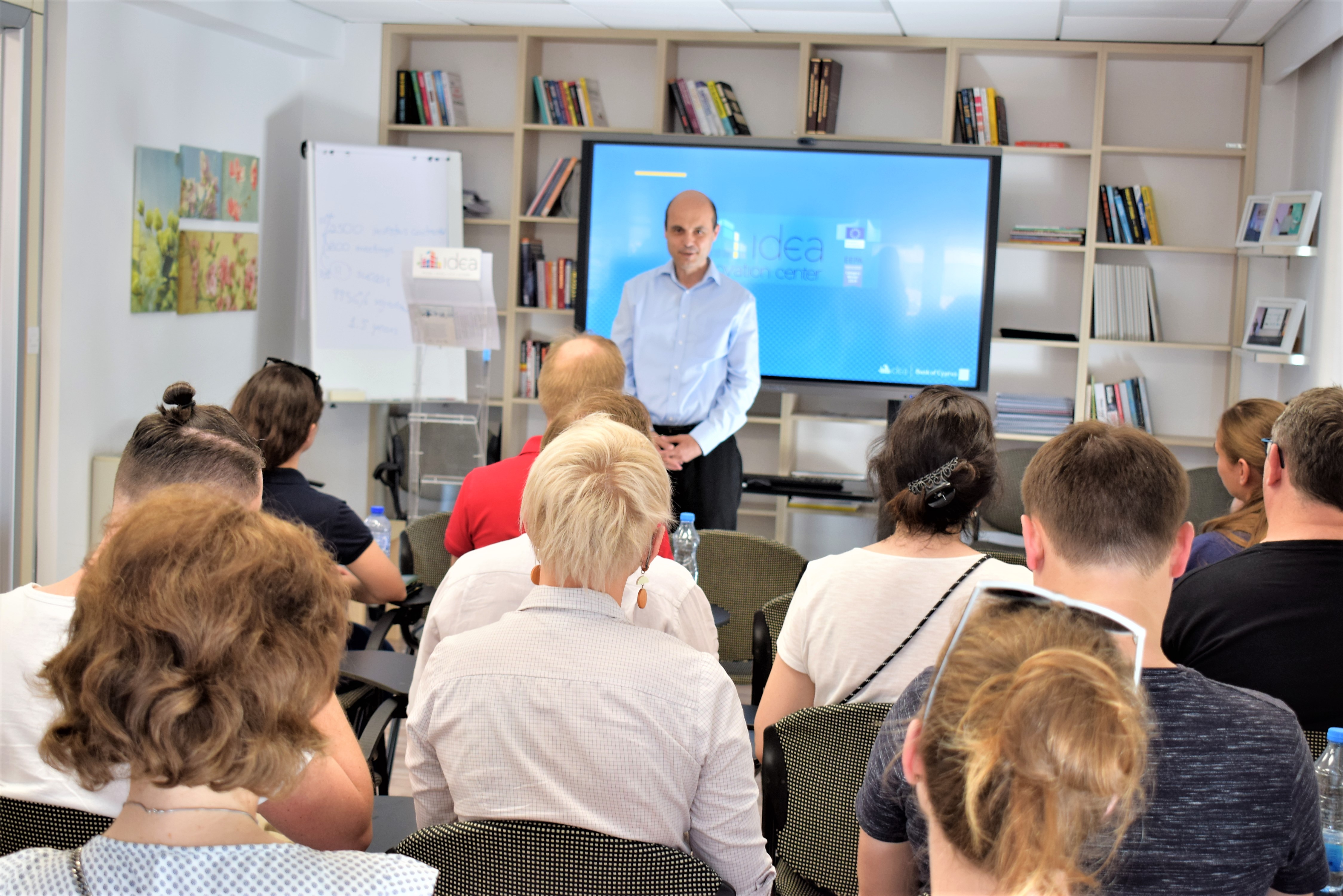 People listening to a presentation