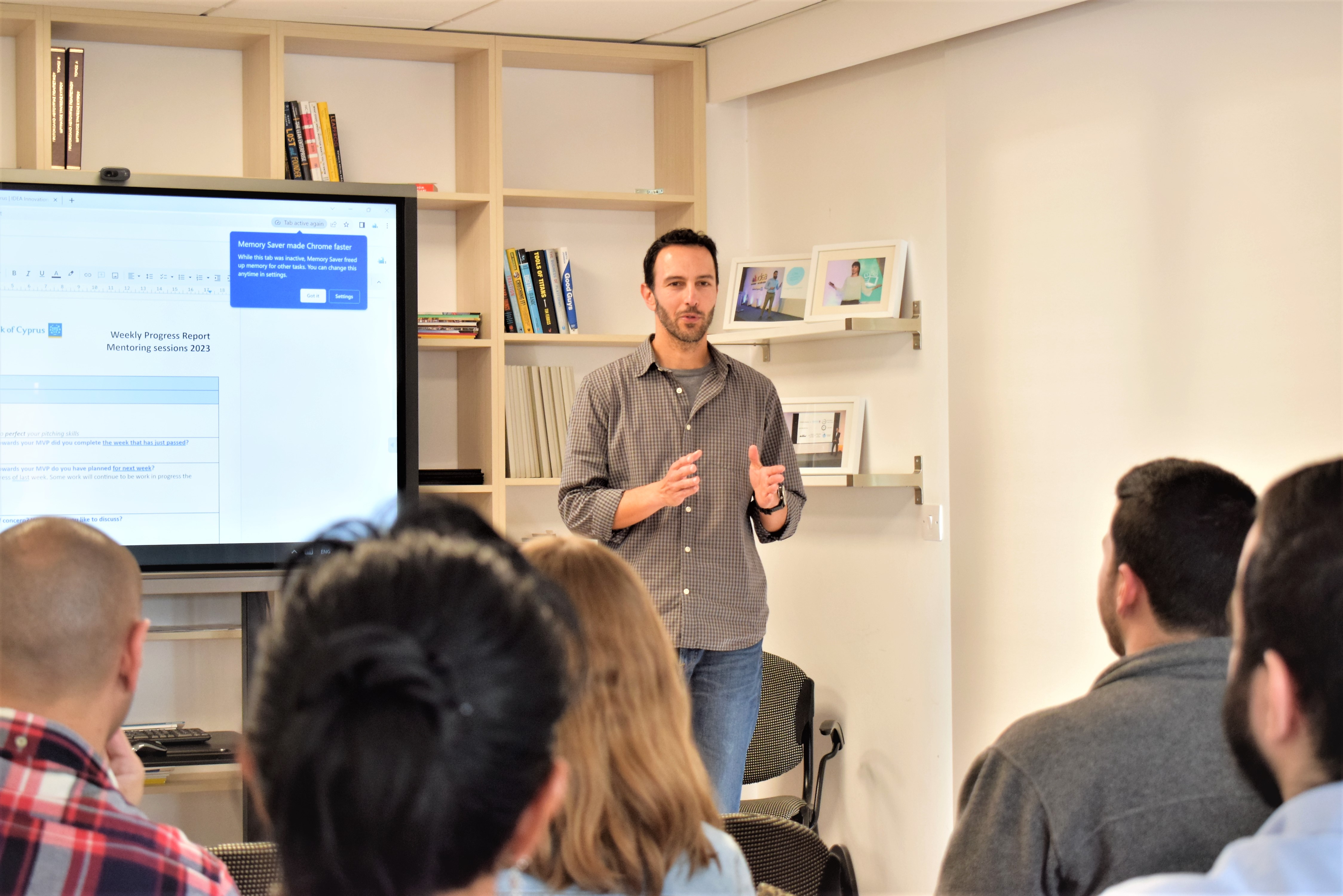 Man presenting to a group of people