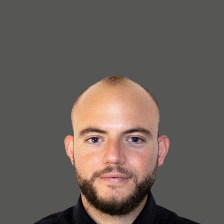 Man with beard looking forward